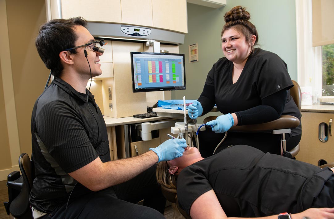 Dental team working on patient