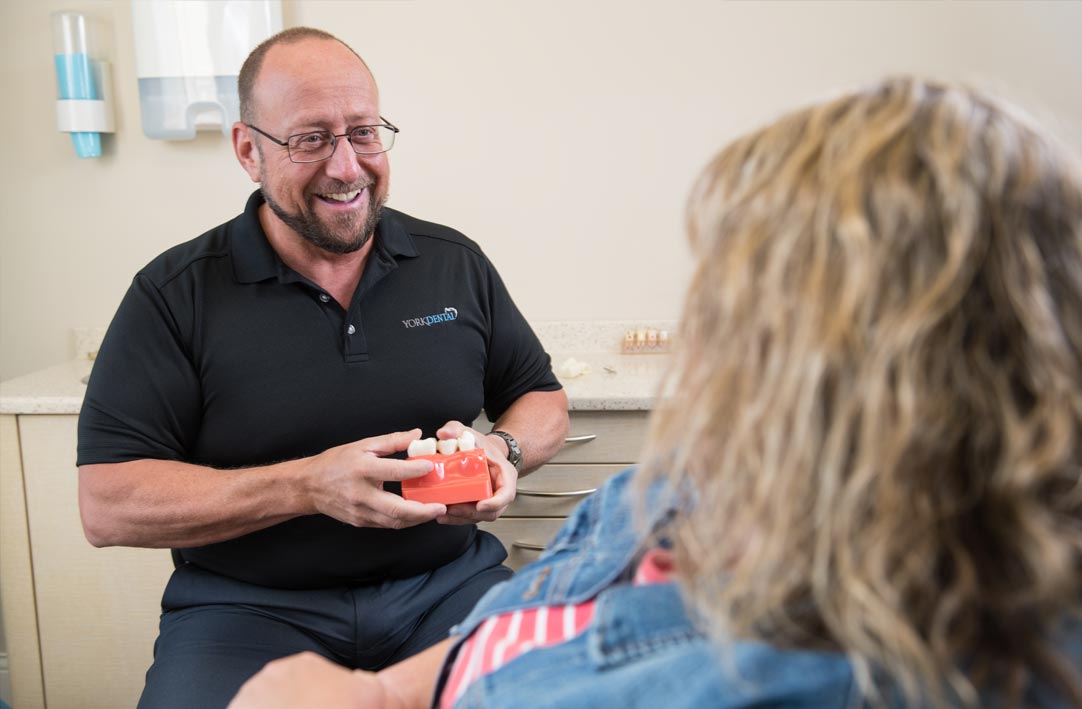 Dentist explaining procedure to patient